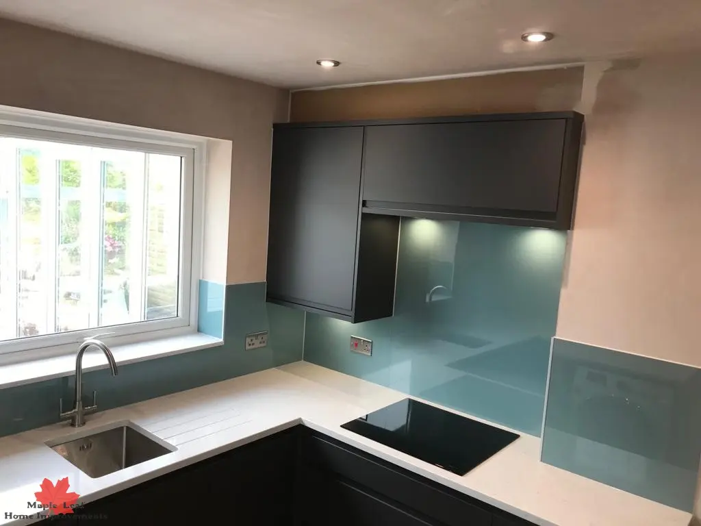Cream fitted kitchen with range cooker